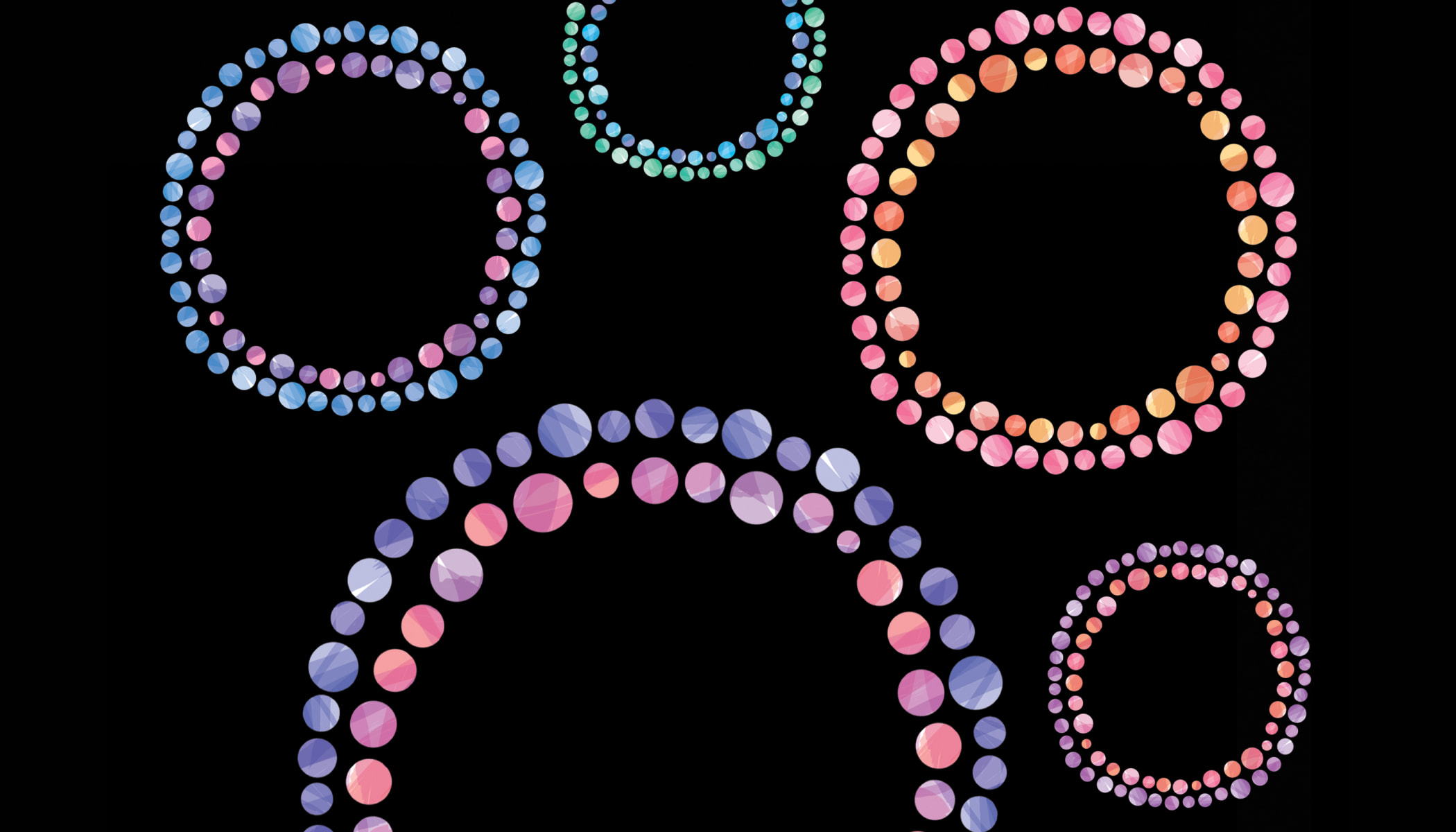 Pink, purple, blue and green double circles on a black background.