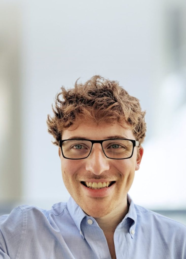 A smiling photo of Ambrose Carr, senior director of data at CZI.