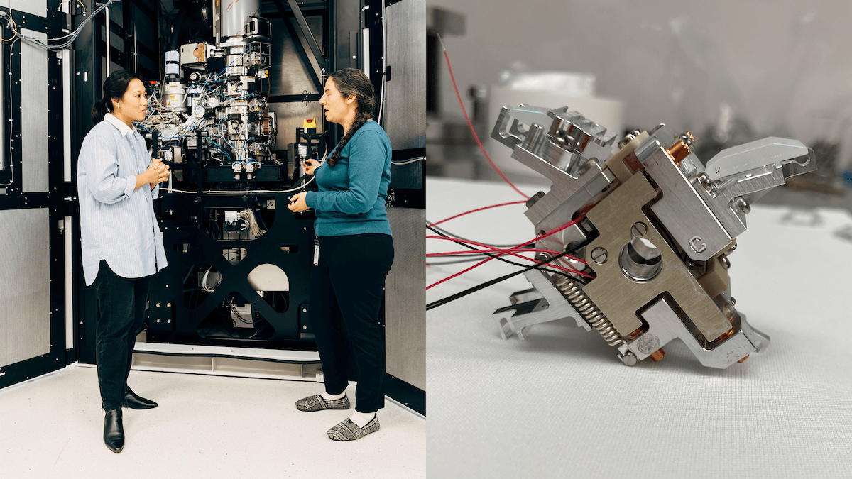 Priscilla Chan and and Biohub researcher Elizabeth Montabana discussing work in front of an open Thermo Scientific Krios cryo-electron microscope at Biohub's imaging lab